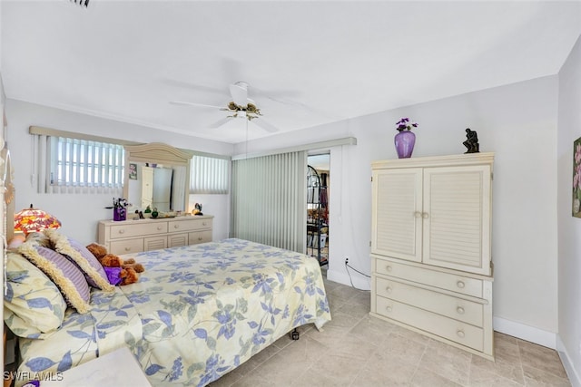 bedroom featuring access to outside and ceiling fan