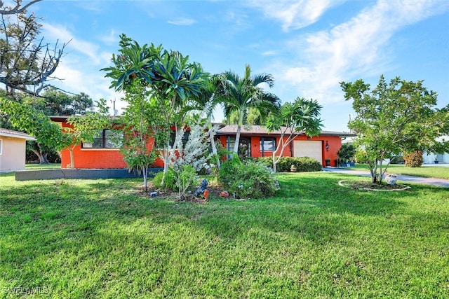 view of yard with a garage