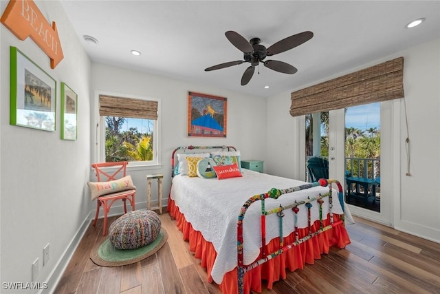 bedroom featuring hardwood / wood-style floors, access to outside, and ceiling fan