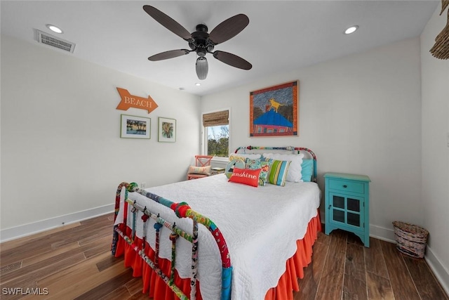 bedroom featuring ceiling fan and dark wood-type flooring