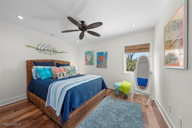 bedroom featuring hardwood / wood-style floors and ceiling fan