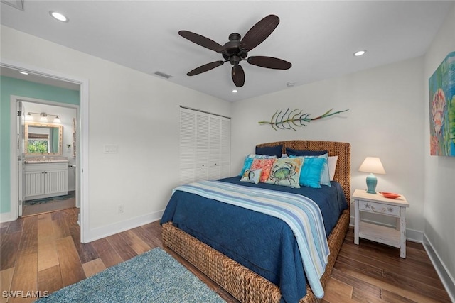 bedroom with ceiling fan, dark hardwood / wood-style floors, and a closet