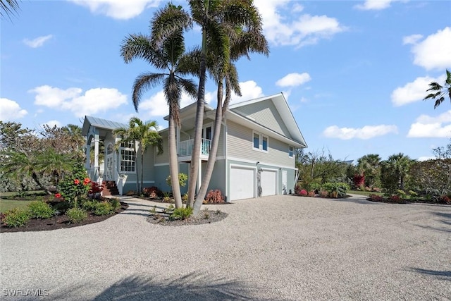 view of side of home with a garage