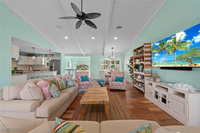 living room with hardwood / wood-style floors, ceiling fan, and lofted ceiling with beams