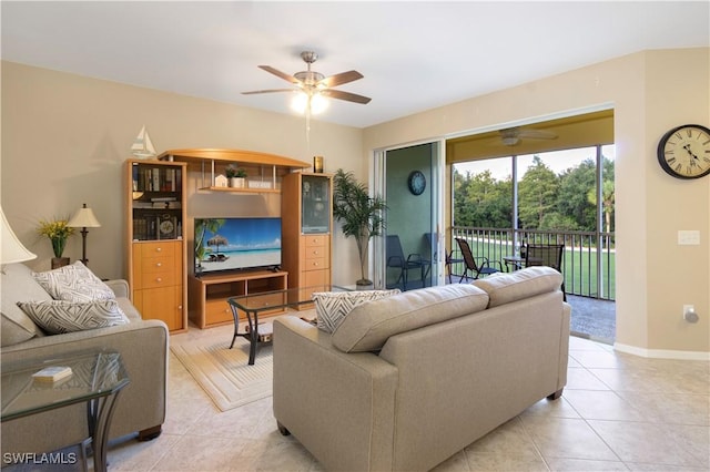 tiled living room with ceiling fan