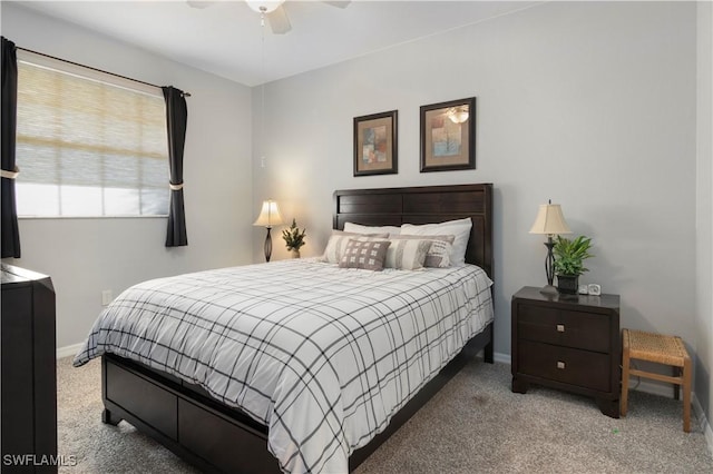 bedroom with ceiling fan and carpet