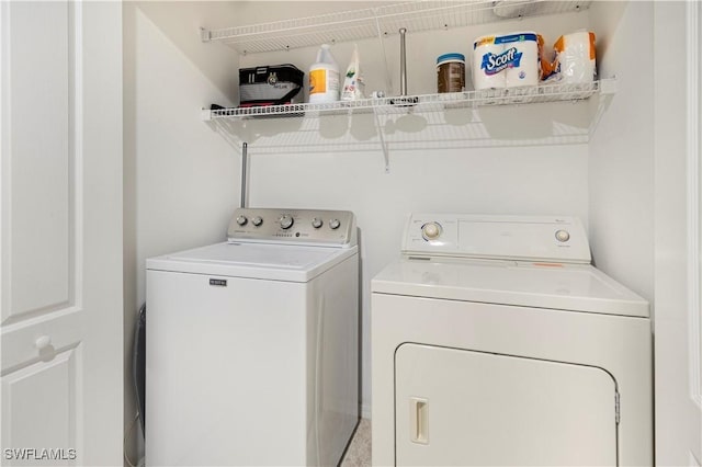 washroom featuring separate washer and dryer