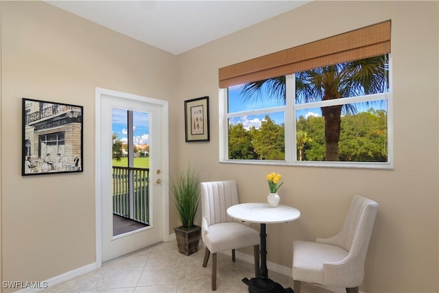 sitting room featuring light tile patterned floors