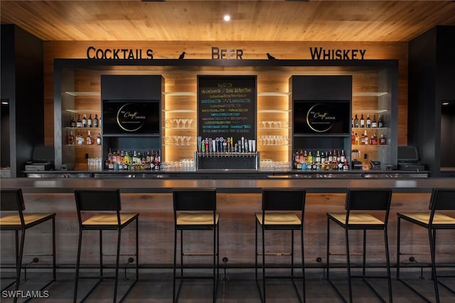 bar featuring wood ceiling