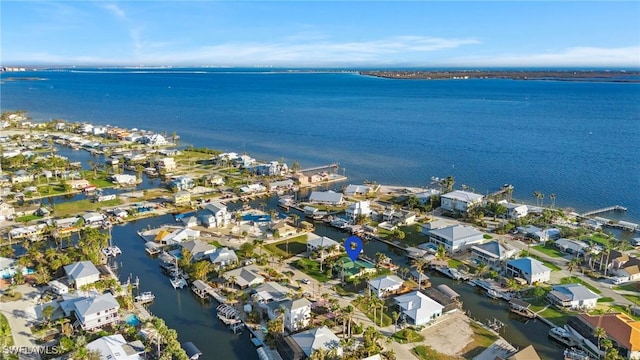 drone / aerial view featuring a water view