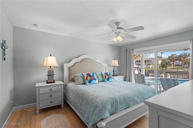 bedroom featuring access to exterior, ceiling fan, and light hardwood / wood-style flooring