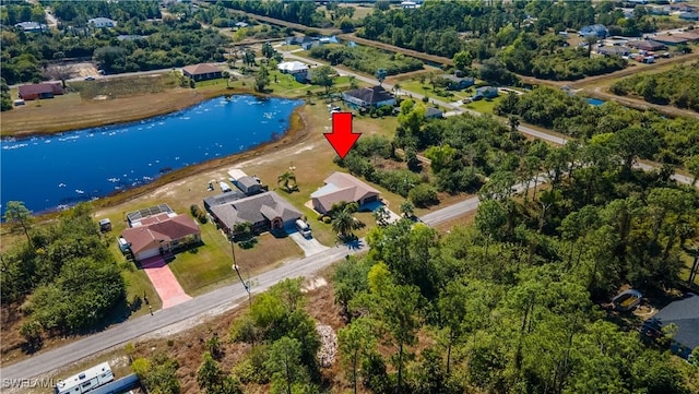 drone / aerial view featuring a water view