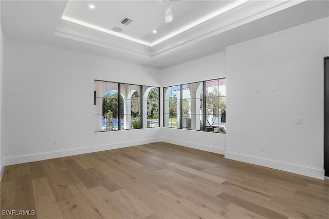 50 Mahogany Dr, Naples, FL 34108 - unfurnished room featuring light wood finished floors, recessed lighting, a raised ceiling, visible vents, and baseboards
