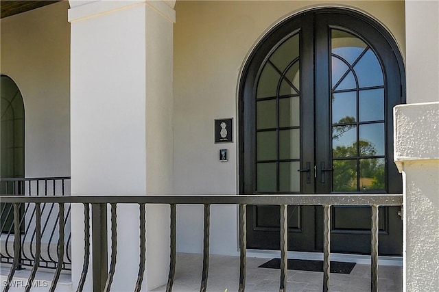 50 Mahogany Dr, Naples, FL 34108 - doorway to property featuring stucco siding