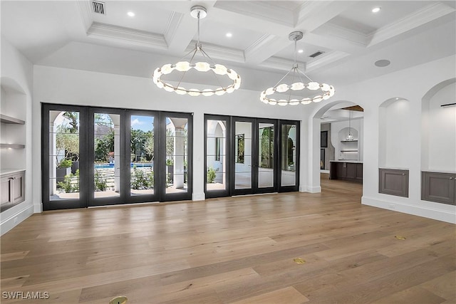 50 Mahogany Dr, Naples, FL 34108 - interior space featuring beam ceiling, coffered ceiling, visible vents, arched walkways, and french doors