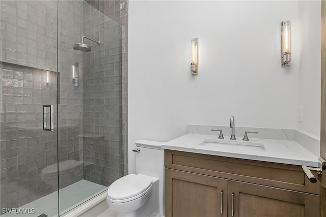 50 Mahogany Dr, Naples, FL 34108 - bathroom featuring vanity, toilet, and a stall shower