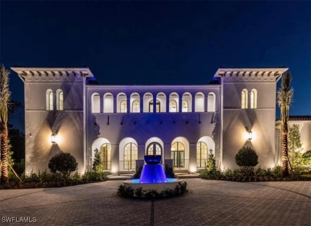50 Mahogany Dr, Naples, FL 34108 - exterior space featuring curved driveway