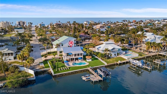 aerial view featuring a water view