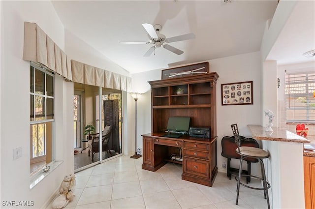 tiled home office with lofted ceiling and ceiling fan