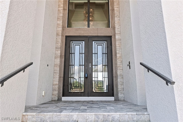 view of exterior entry with french doors