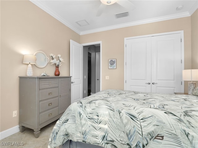 bedroom with baseboards, a closet, visible vents, and crown molding