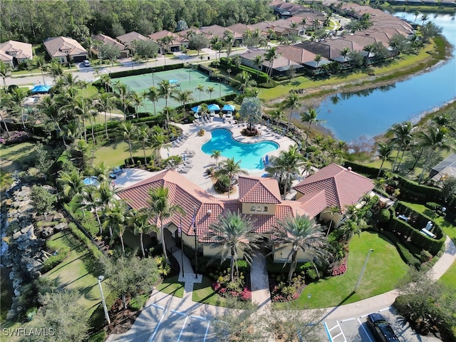 bird's eye view with a residential view and a water view