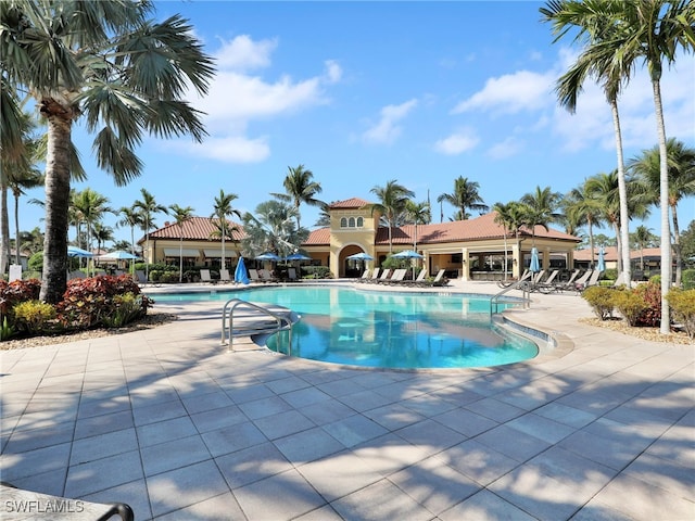 pool with a patio area