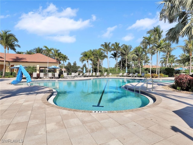 community pool with a patio