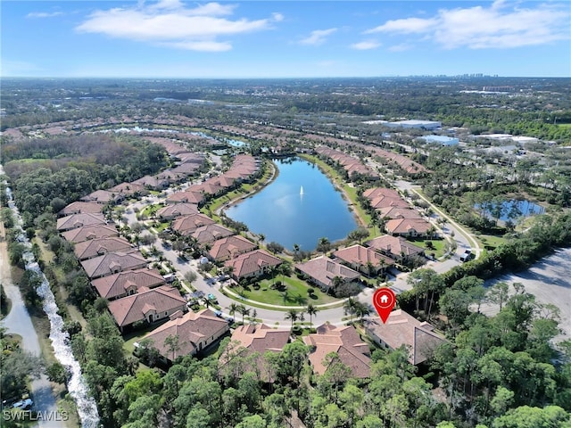 bird's eye view featuring a residential view and a water view