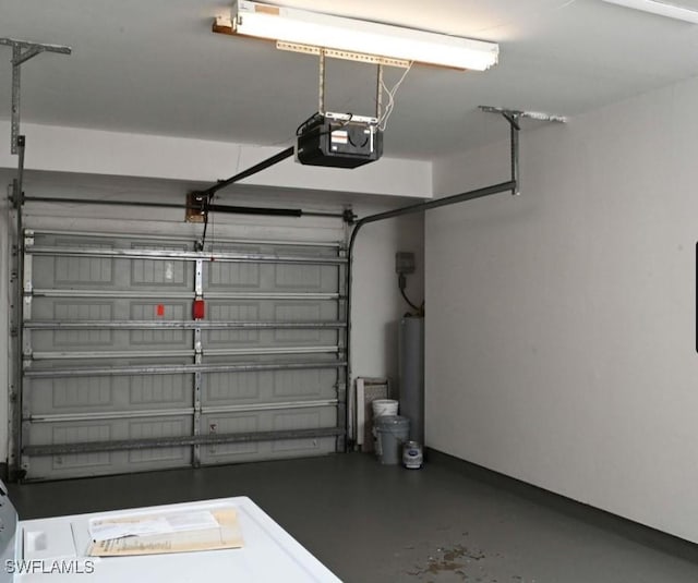 garage with a garage door opener and gas water heater