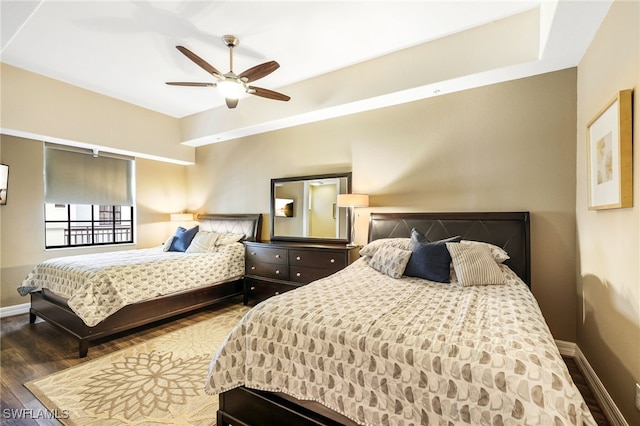 bedroom with hardwood / wood-style floors and ceiling fan