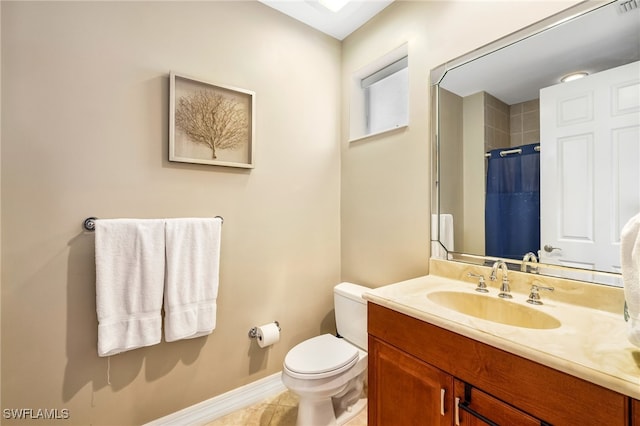 bathroom with vanity, tile patterned flooring, toilet, and a shower with shower curtain