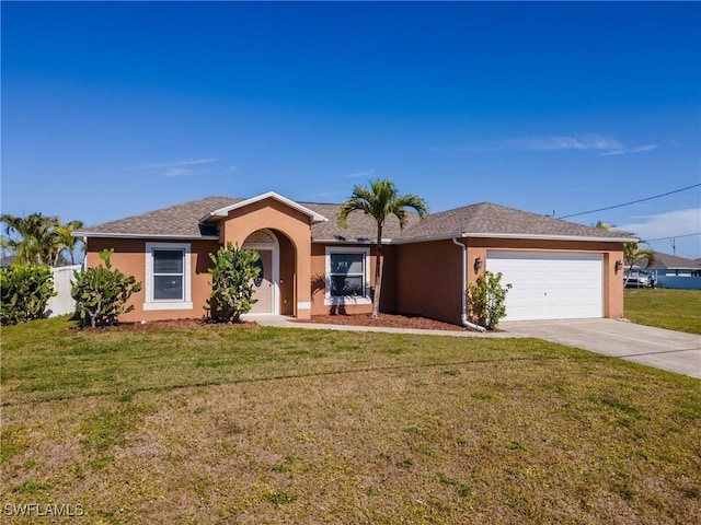 ranch-style home featuring a garage and a front lawn