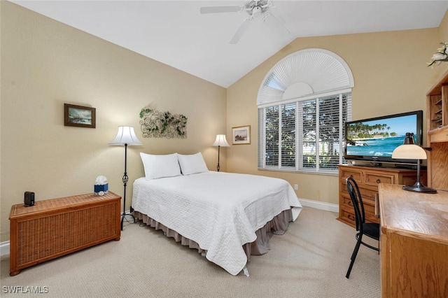 carpeted bedroom with ceiling fan and lofted ceiling