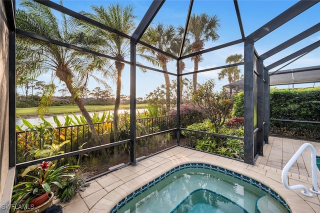 view of pool with a jacuzzi