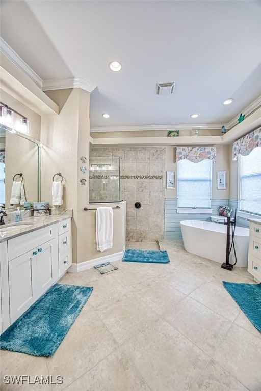 bathroom featuring vanity, crown molding, and plus walk in shower