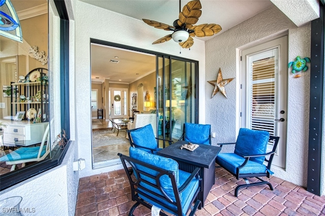 view of patio with ceiling fan