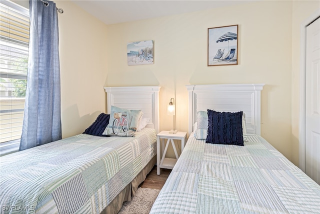 bedroom featuring hardwood / wood-style flooring