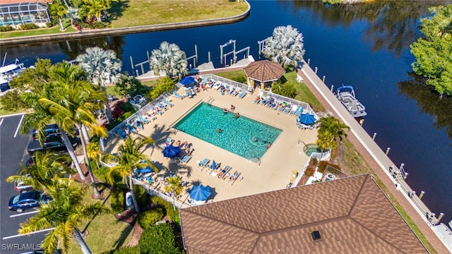 birds eye view of property featuring a water view