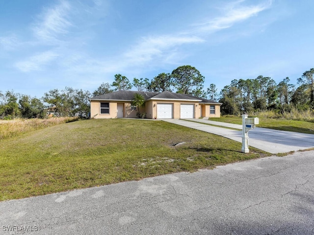 view of front facade with a garage and a front yard