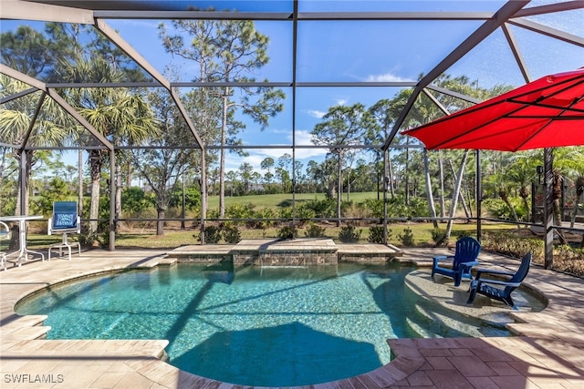 view of swimming pool featuring a patio and glass enclosure