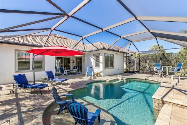 view of pool featuring a patio and a lanai