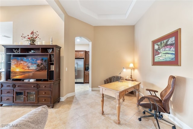 interior space with a tray ceiling