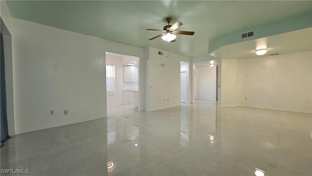 spare room with ceiling fan