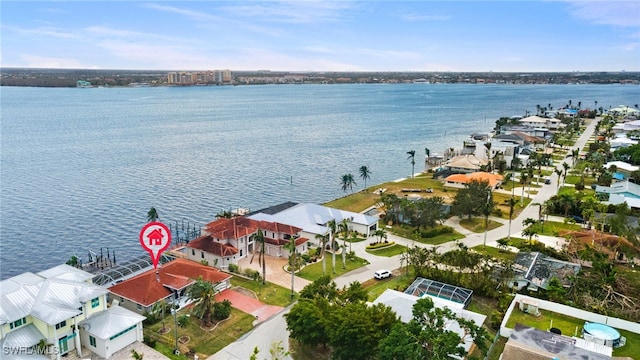 aerial view featuring a water view and a residential view