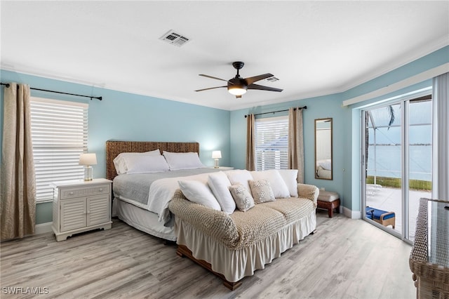 bedroom featuring light hardwood / wood-style flooring, access to outside, ornamental molding, and ceiling fan