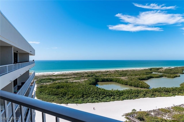 property view of water featuring a beach view