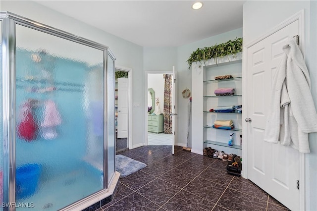 bathroom with an enclosed shower