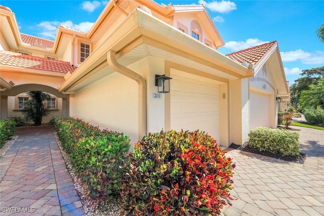 view of home's exterior featuring a garage