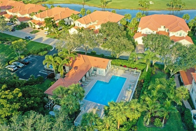 bird's eye view with a water view